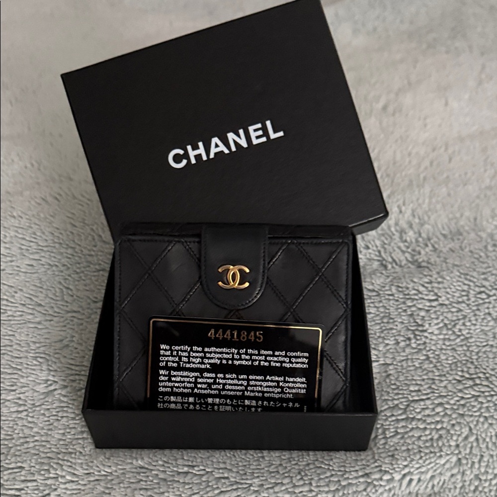 CHANEL Black Leather Wallet with Gold Accent